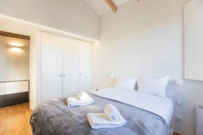 Modern 2BR Duplex Downtown by Art District by LovelyStay